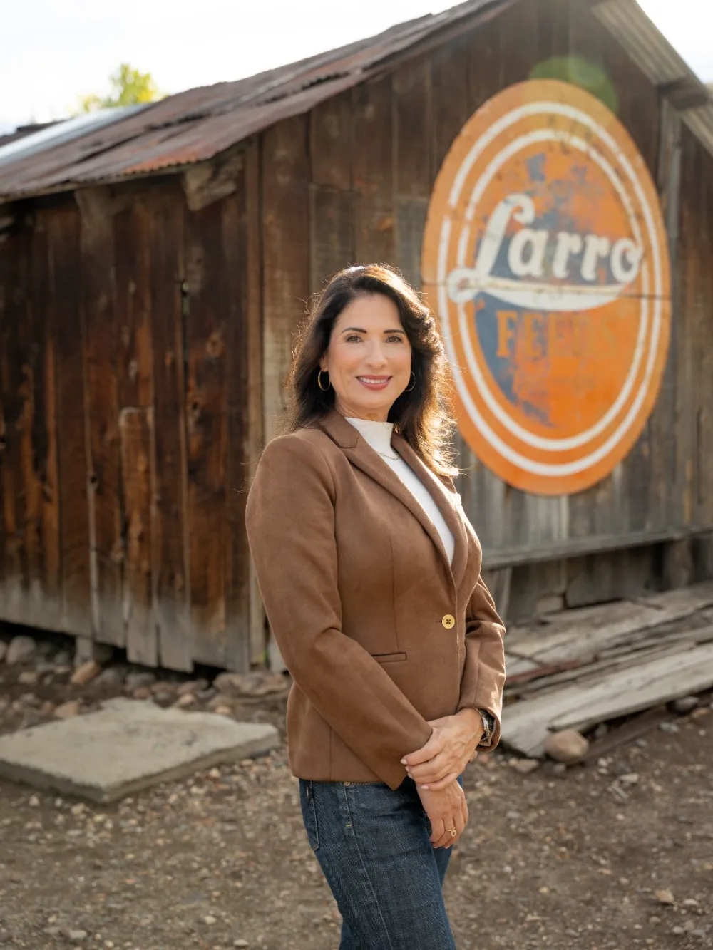 Adriana Guzmán Fralick in front of a historic Nevada barn